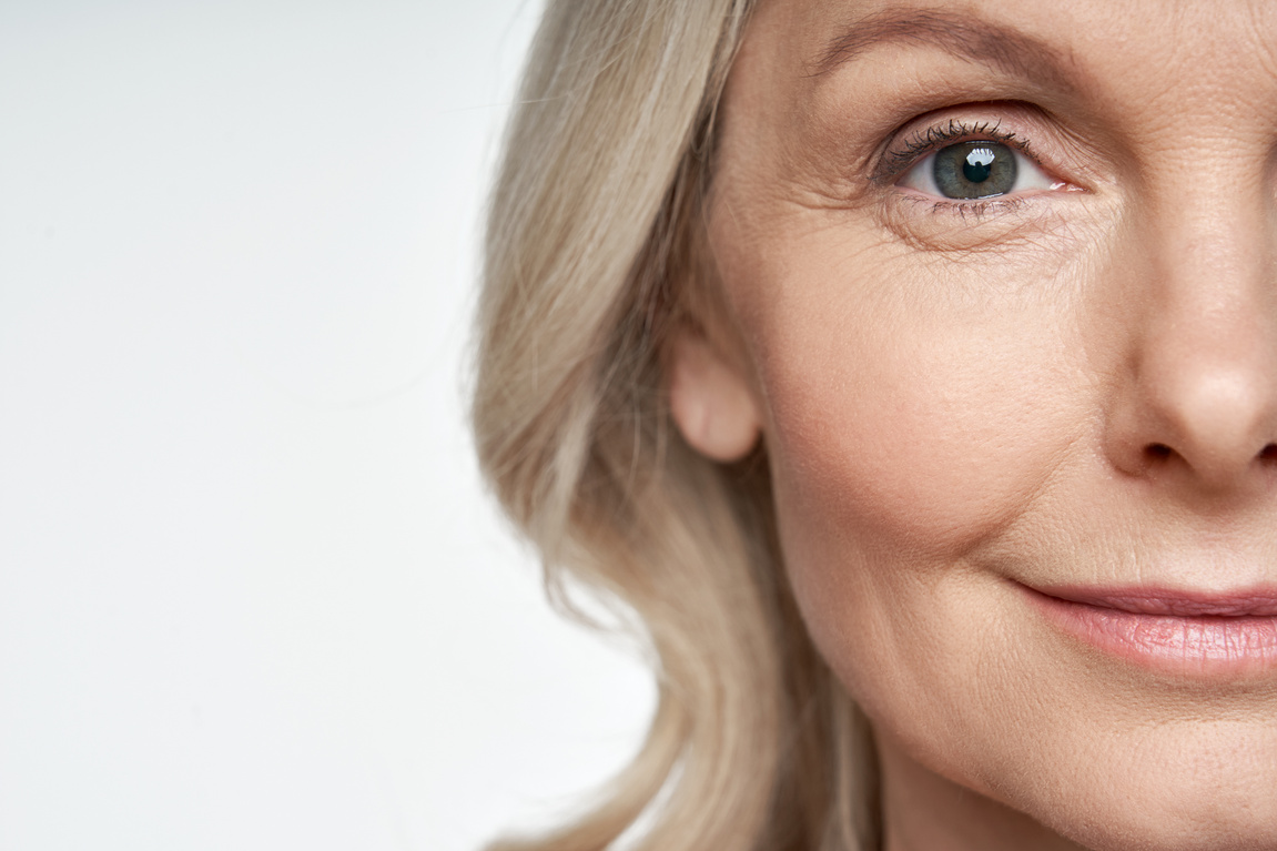 Old Beautiful Woman Looking at Camera